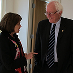 Senator Sanders speaks with a constituent