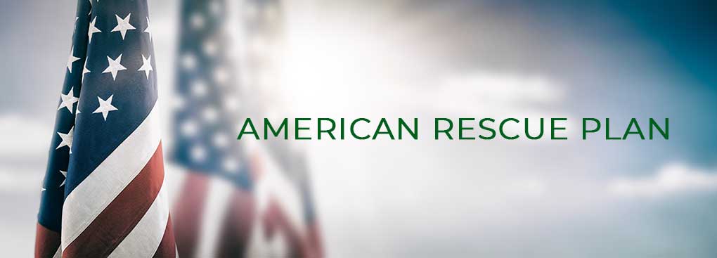 American Rescue Plan title with American flags in the background